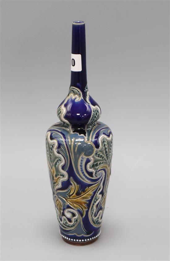 A Doulton Lambeth tall slender bottle vase, by Edith D Lupton, no. 966 with incised shell and foliate design H. 30.5cm